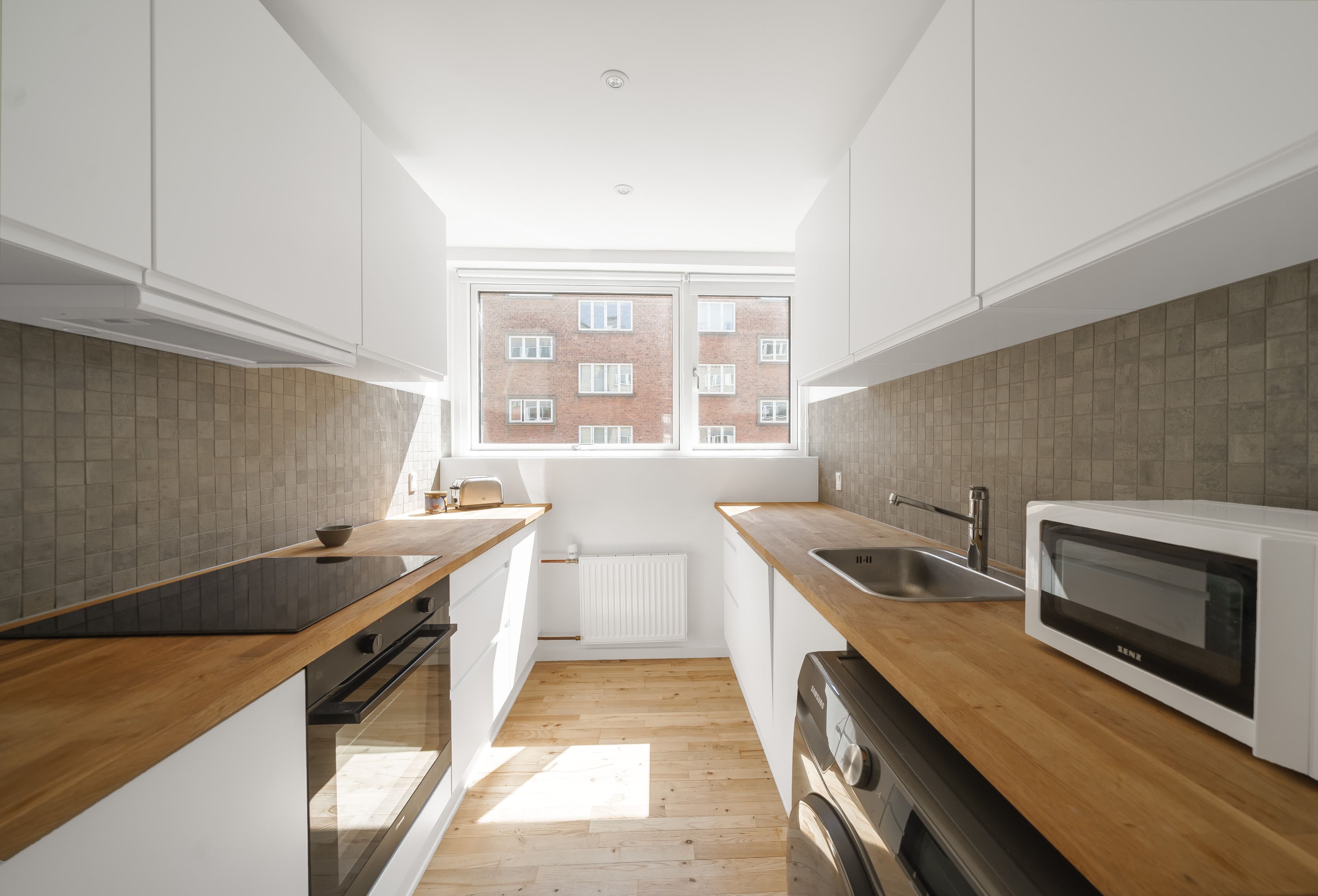 A modern kitchen in a Movinn apartment